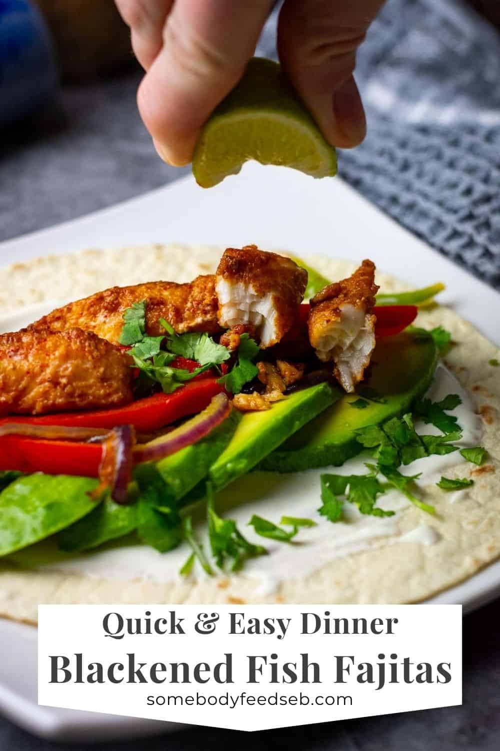 Lime juice being squeezed onto blacked fish fajitas on a white plate. Pin for Pinterest.