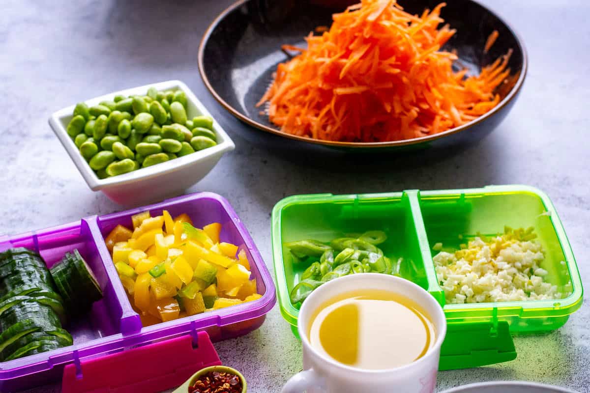 Vegetables dices and cut on a worktop.