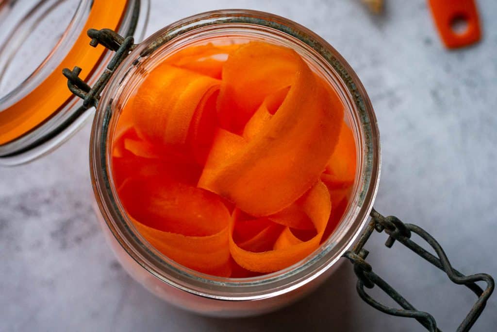 Carrot ribbons in a mason jar.