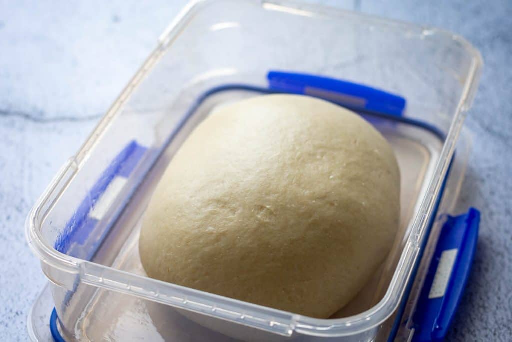 Sourdough in a large container at the start of bulk fermentation.