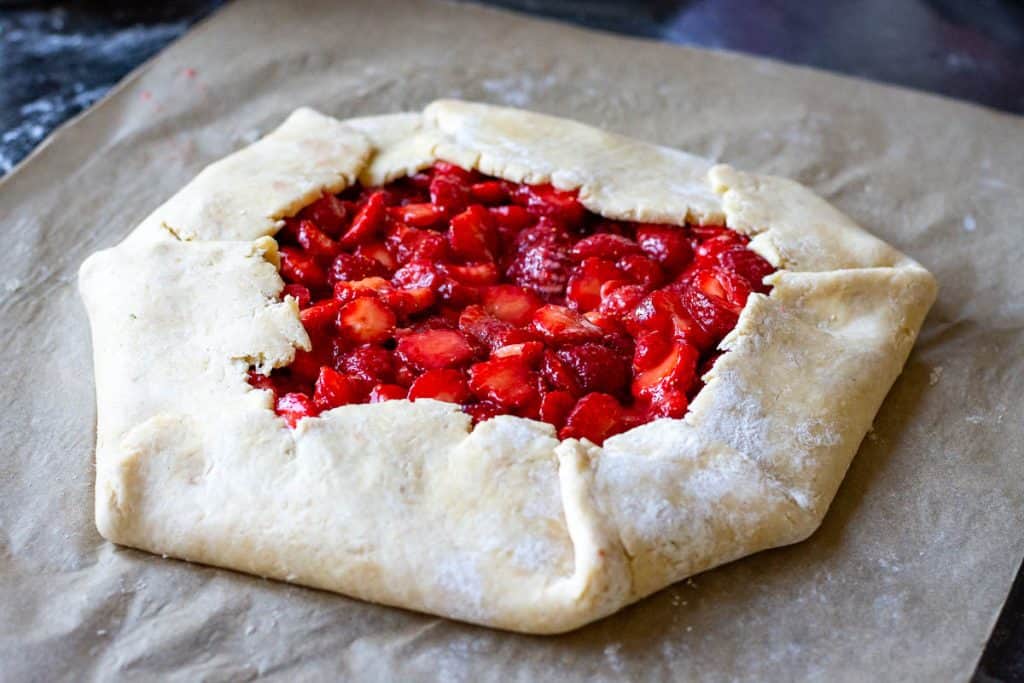 Sourdough discard galette pastry edges folded over the filling.