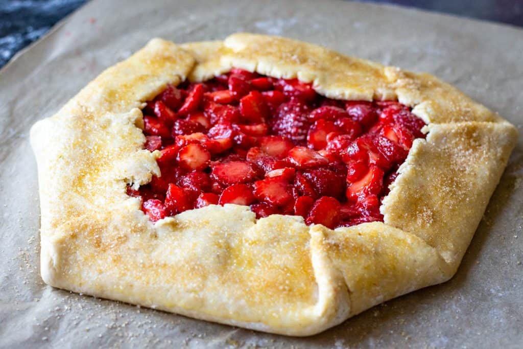 Demerara sugar sprinkled on the edges of the sourdough galette pastry.