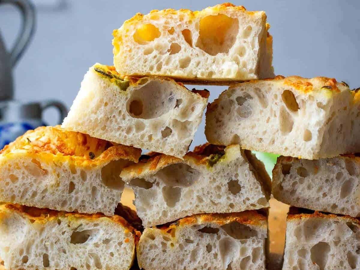 A stack of jalapeno cheddar sourdough focaccia slices.