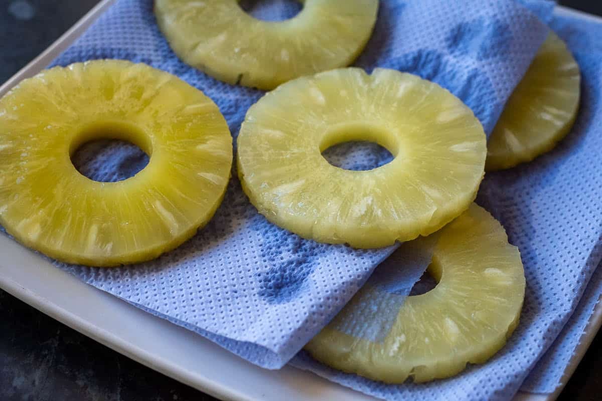 Pineapple rings on paper towel to absorb excess moisture.