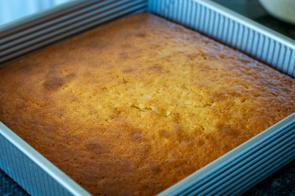 Golden brown top of the baked sourdough pineapple upside down cake.