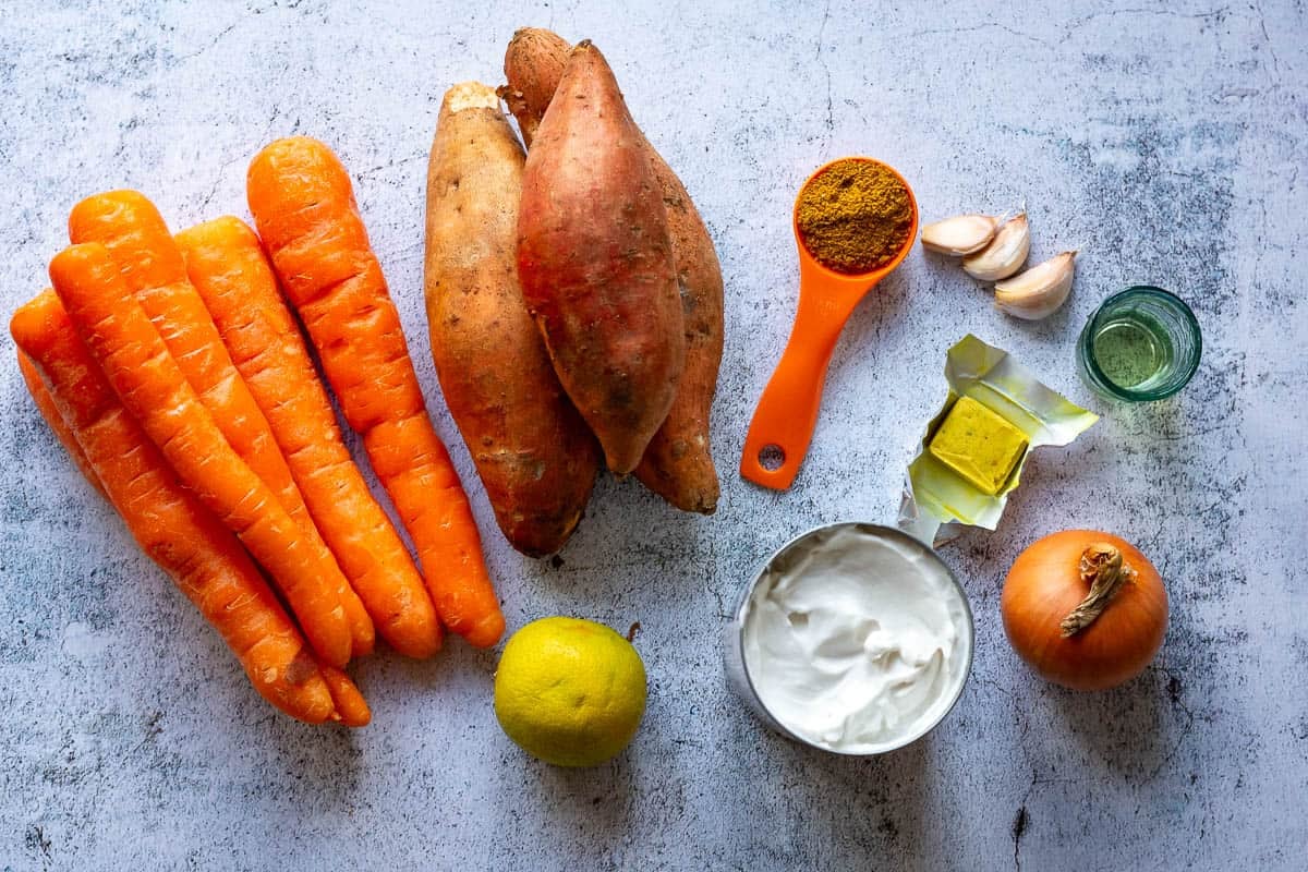 Ingredeints for sweet potato carrot soup with coconut milk.