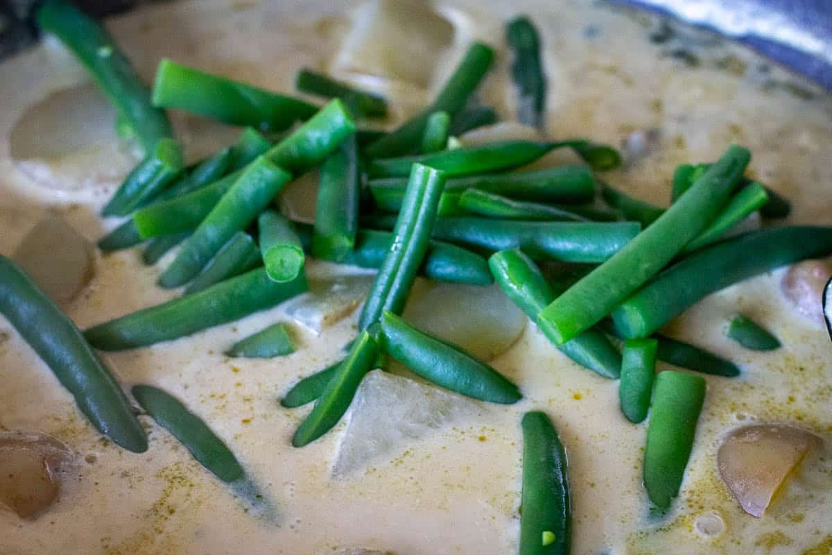Par-boiled vegetables added to the Thai Green curry sauce.
