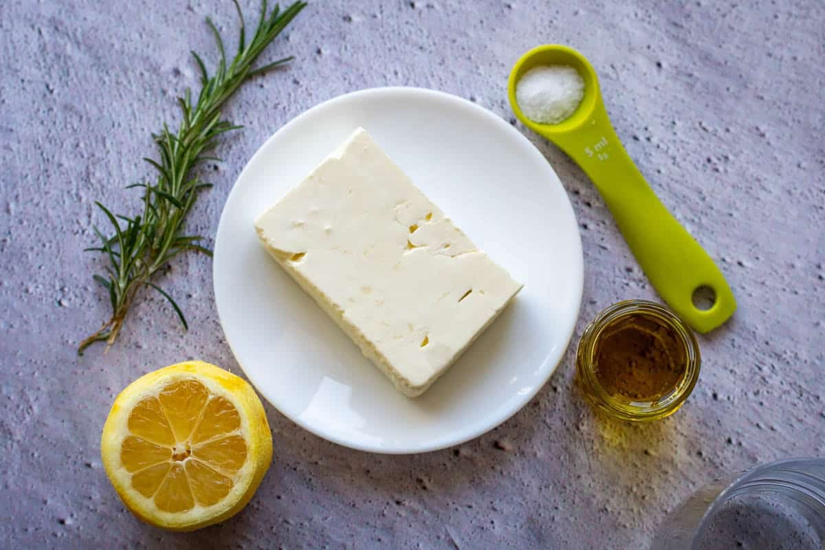 Sourdough focaccia toppings including lemon, feta, honey, rosemary and flaky sea salt.
