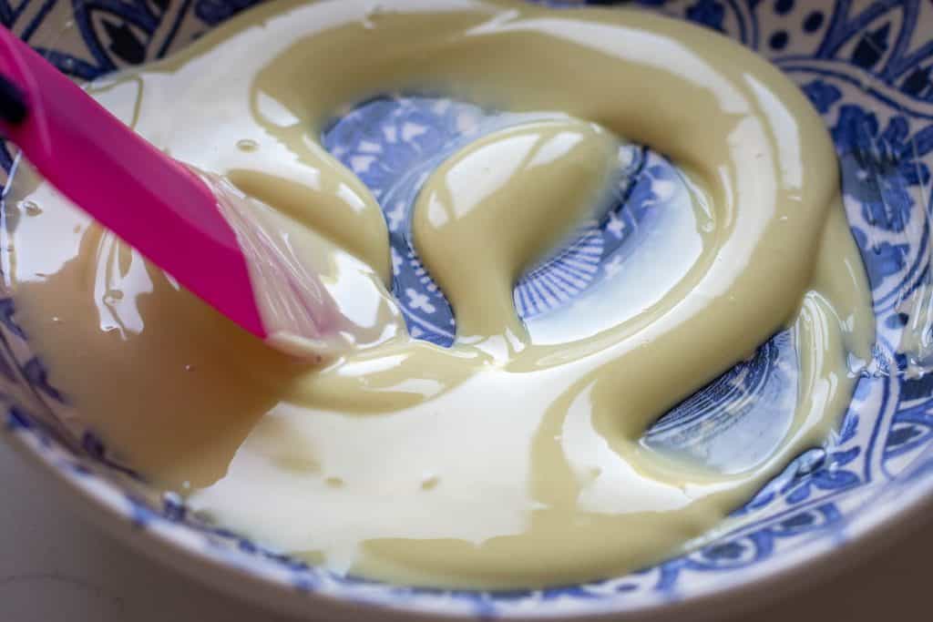 Melted white chocolate.