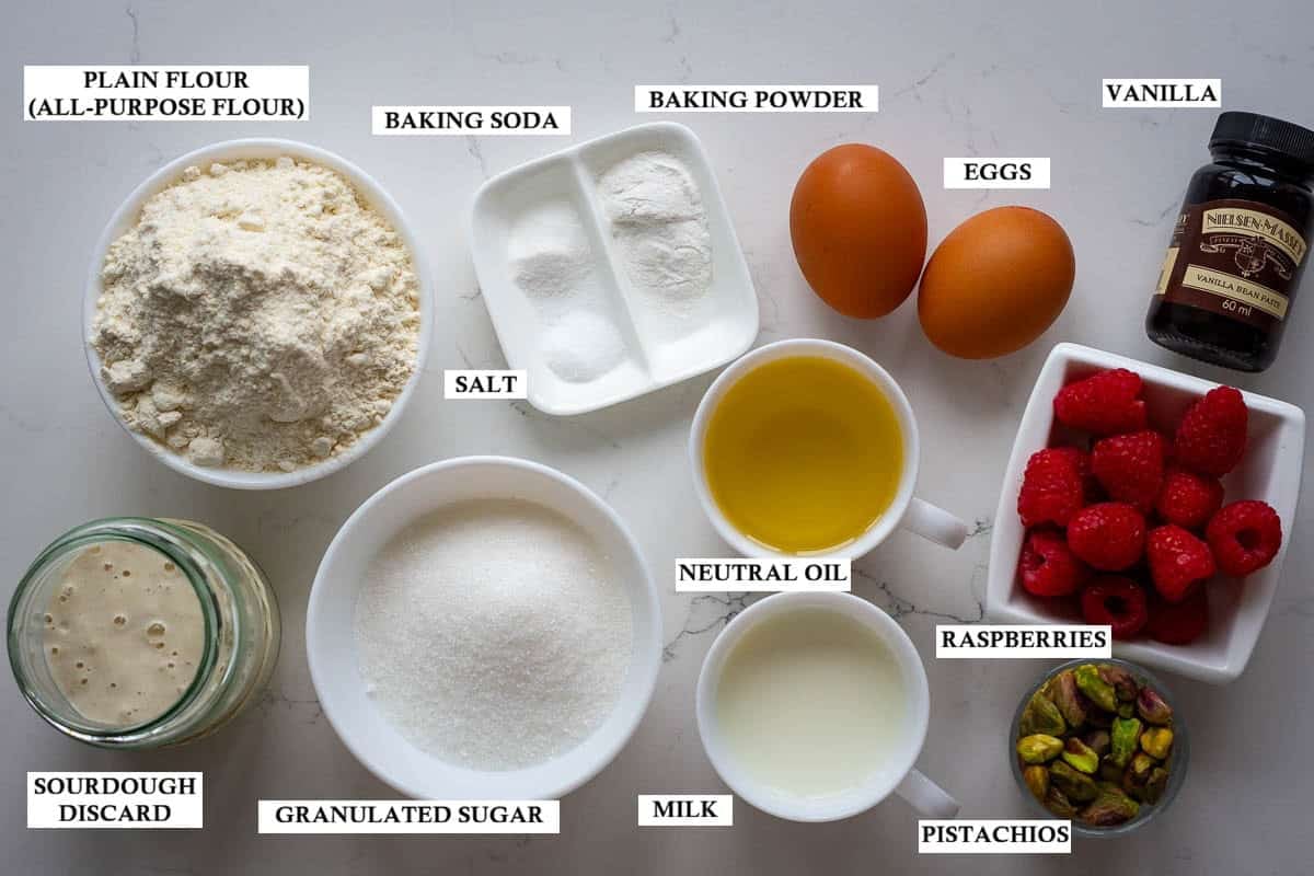 Labelled ingredients for sourdough muffins with raspberries and pistachios.