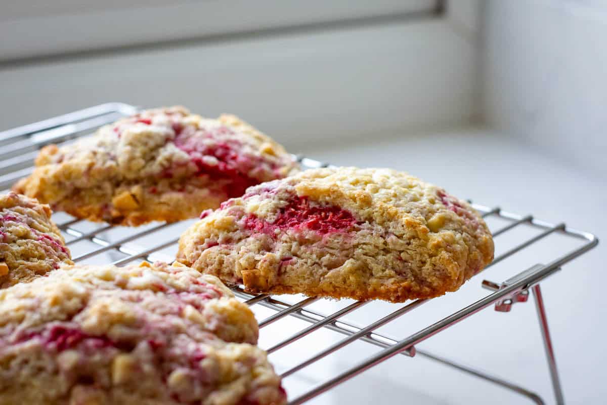 Sourdough scones cooling on a wire rack.