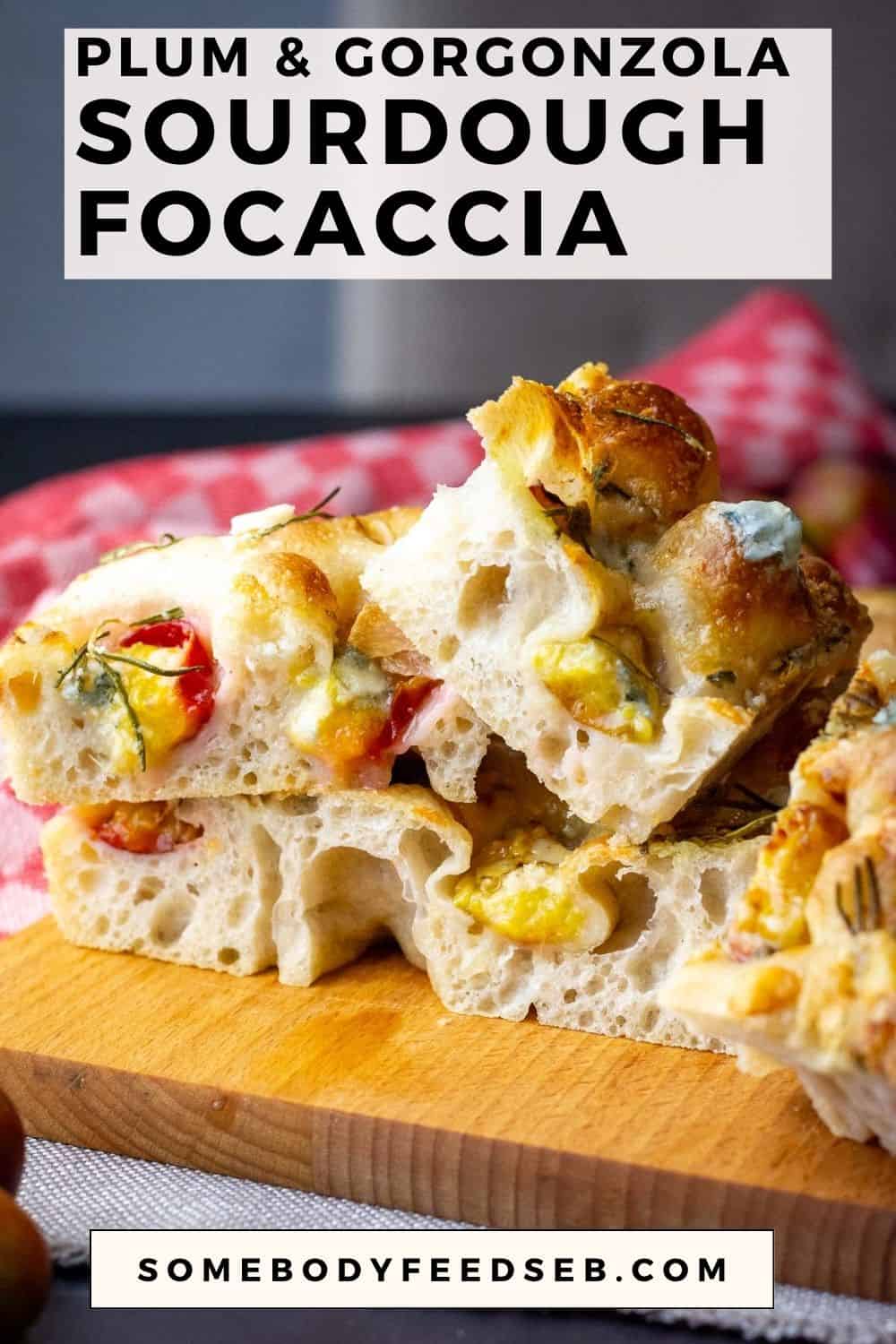 Plum and Gorgonzola Sourdough Focaccia squares on a wooden board. Pin for Pinterest.