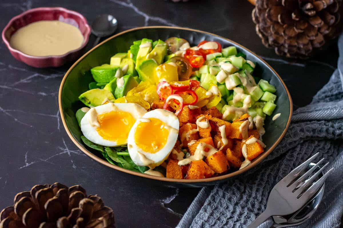 Butternut Squash bowls topped with soft boiled egg halves.