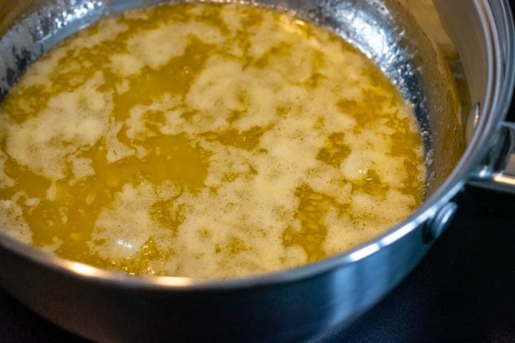 Melted butter in a small saucepan.