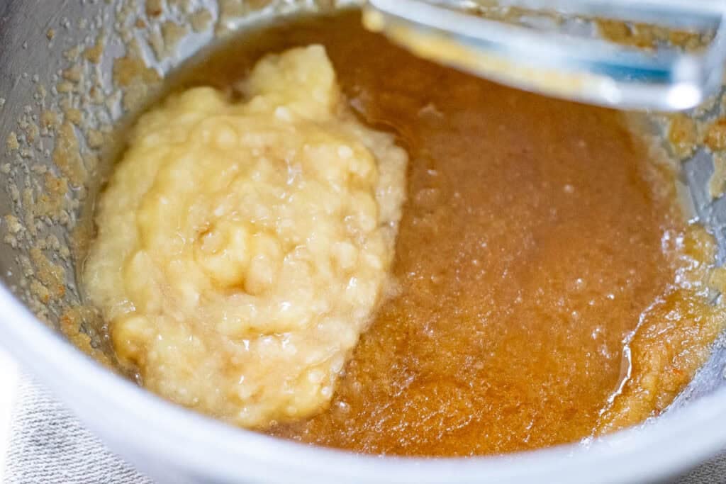 Mashed banana added to the wet ingredients.