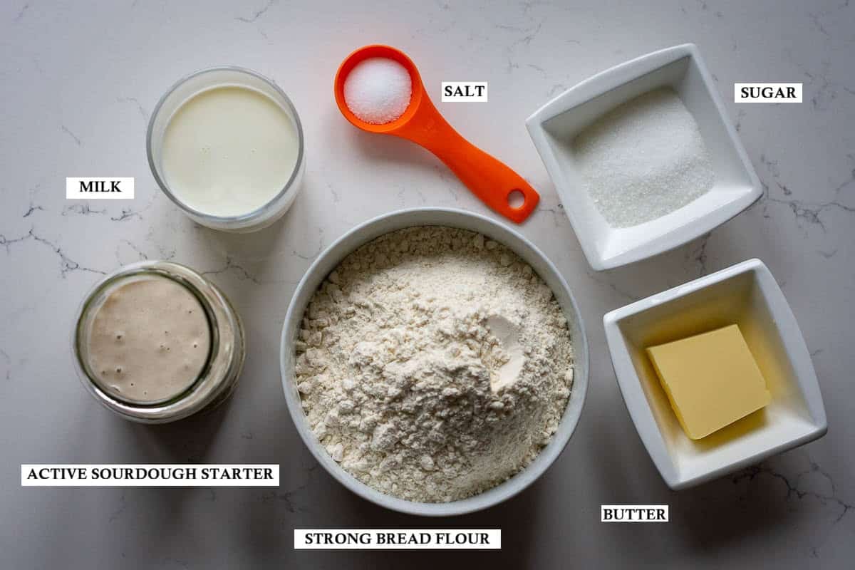 Labelled ingredients for Sourdough Pullman Loaf on a light kitchen worktop.