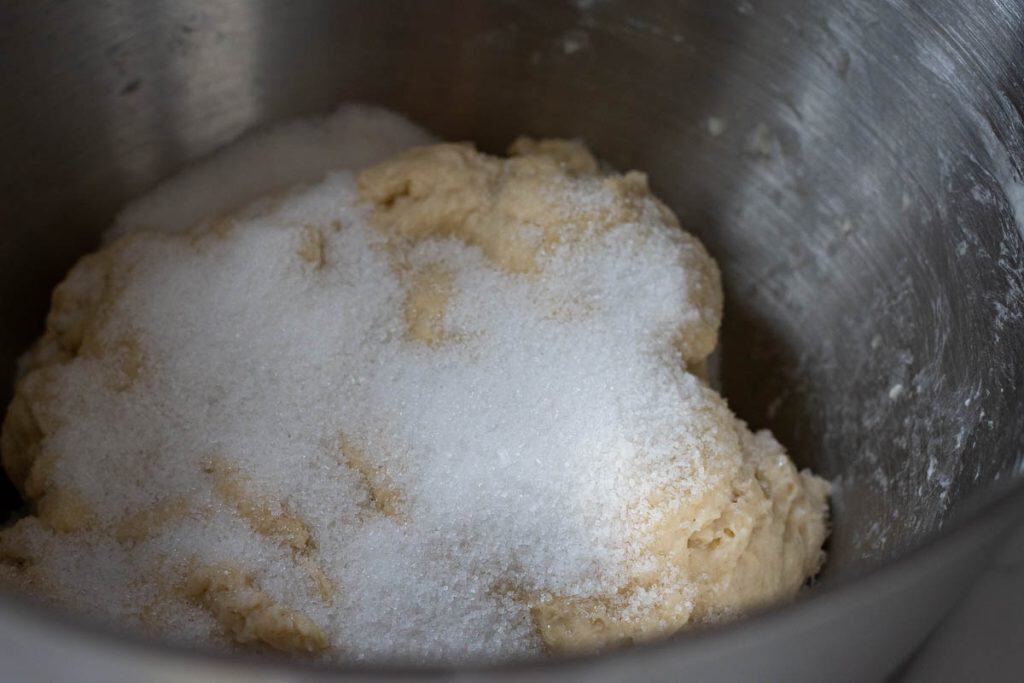 Sugar and salt added to sourdough mixture.