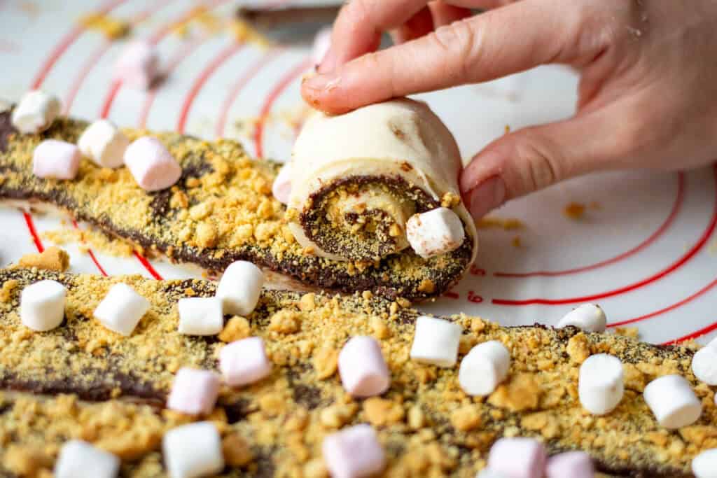 Rolling the sourdough s'mores rolls into spirals.