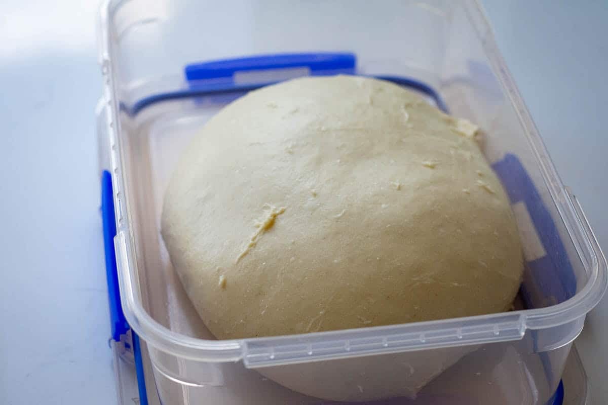 Enriched sourdough in a container at the start of bulk fermentation.