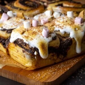 Sourdough S'mores Rolls with marshmallow fluff and mini marshmallows on top.