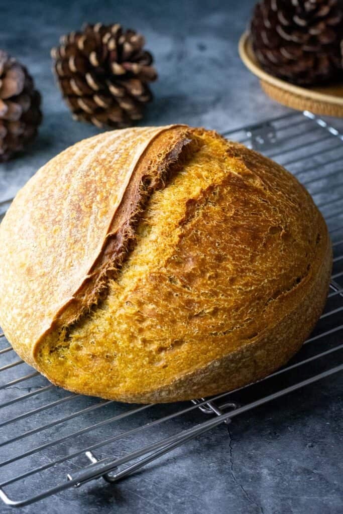 Sourdough cooling on a wire rack.