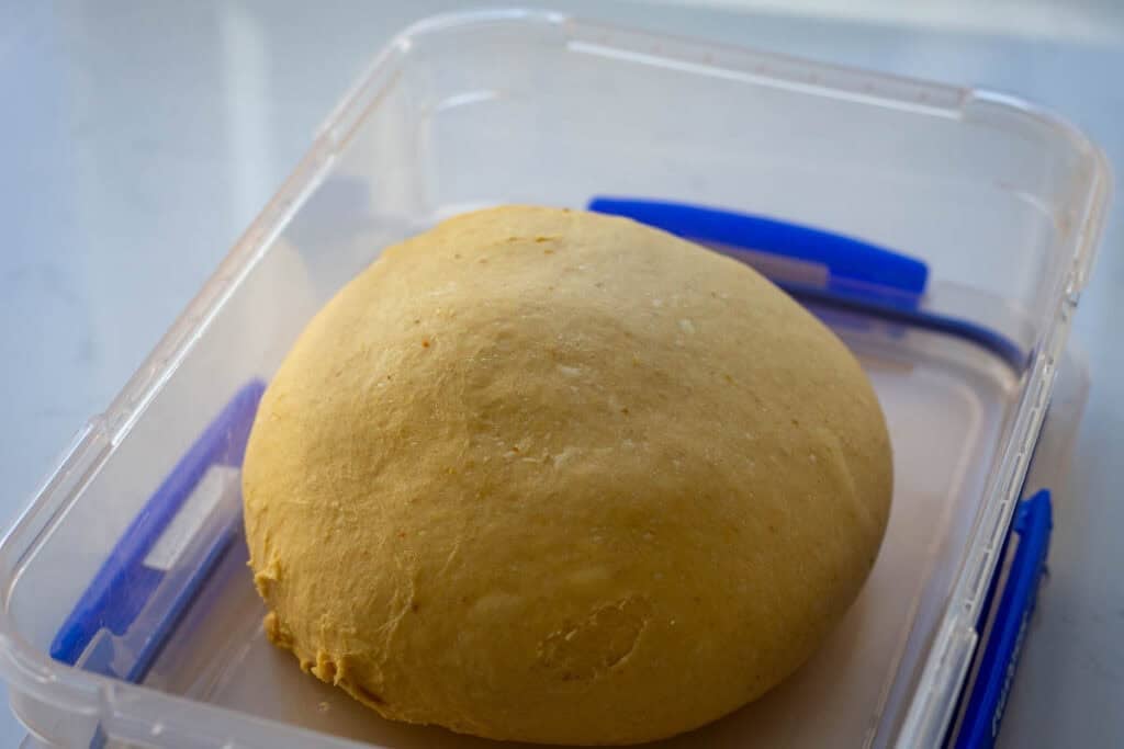Pumpkin sourdough babka dough at the beginning of the bulk fermentation.