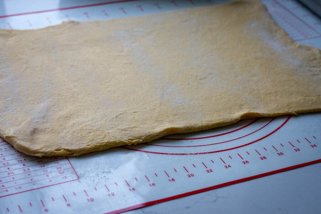 A large rectangle of rolled out sourdough.